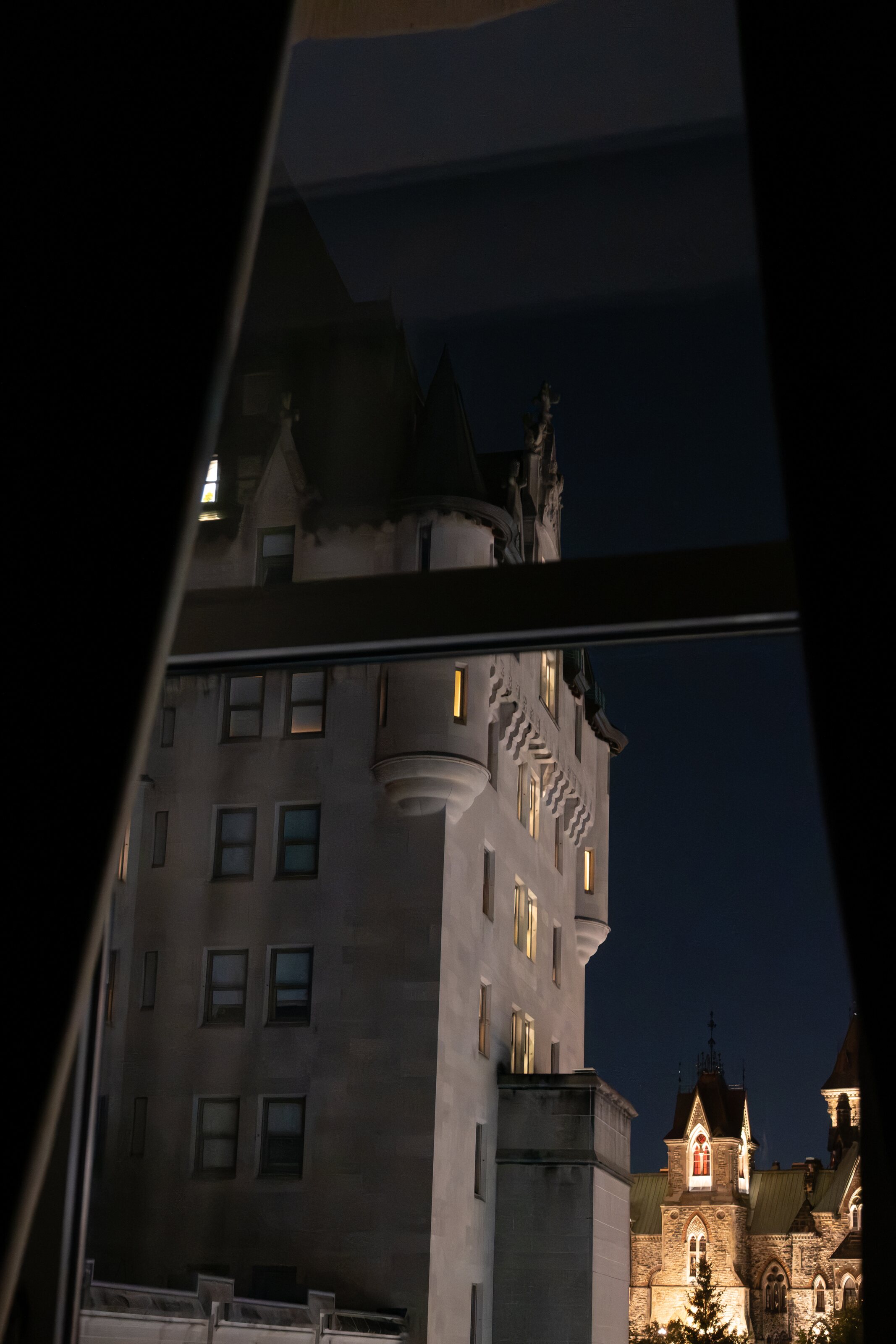 The Peace Tower glimpsed through an angular reflection