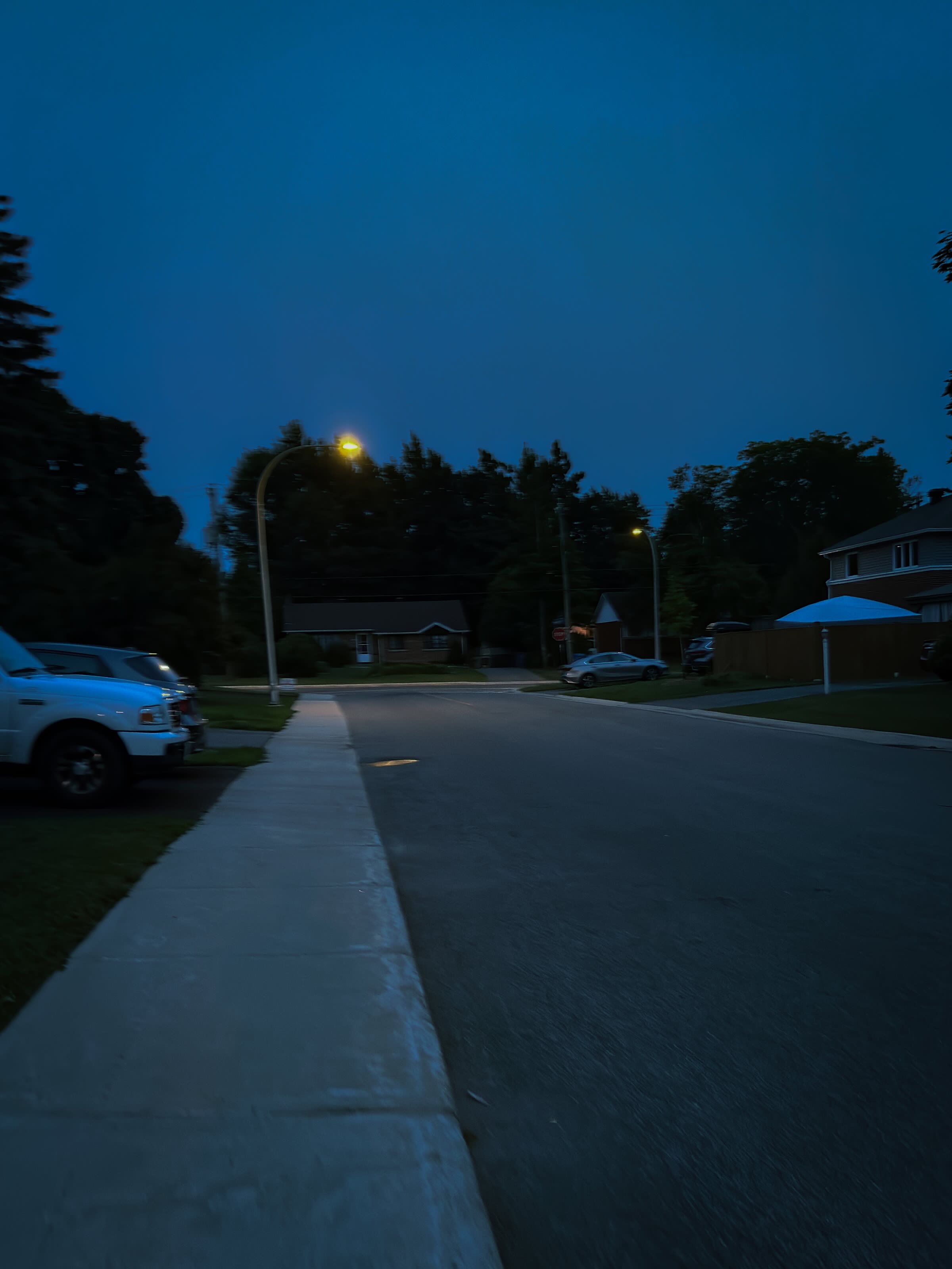 A quiet suburban street at dusk